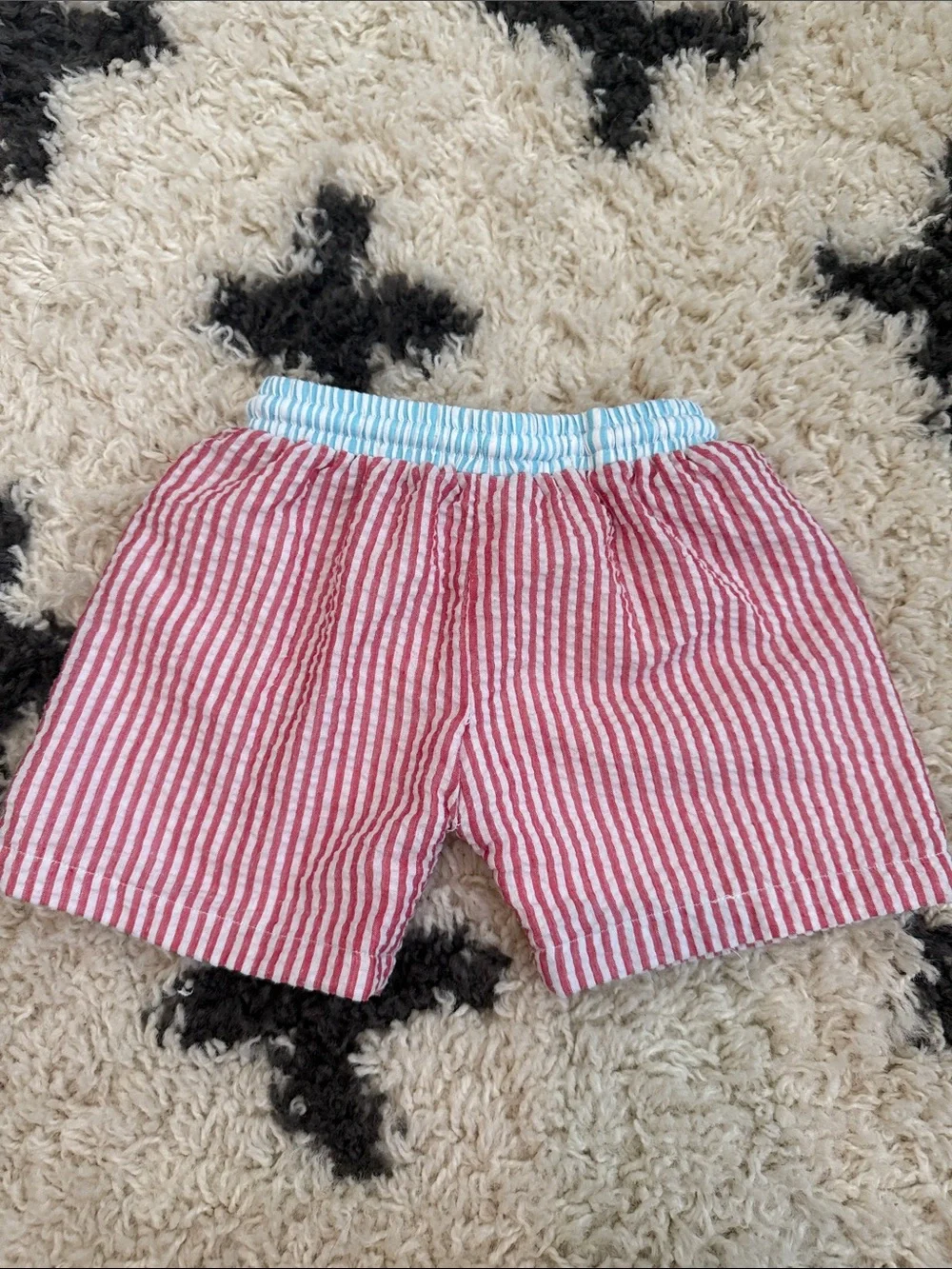 Smocked spidey & friends swim trunks